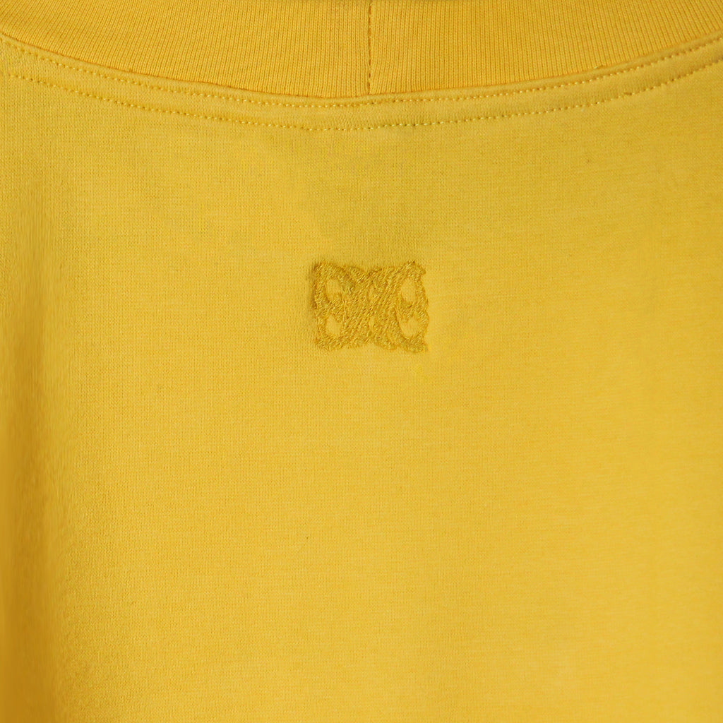 Camiseta de manga larga amarilla